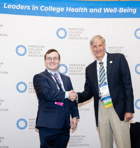 Two professional people shaking hands
