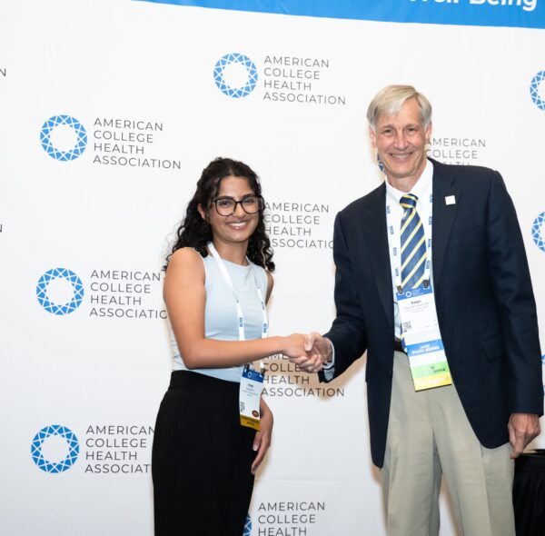 Two professional people shaking hands