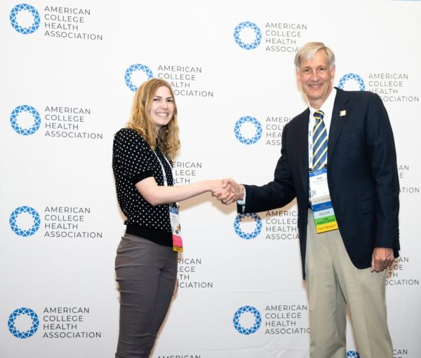 Two professional people shaking hands