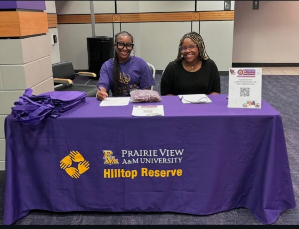 Prairie View A&M University Students at a table for the Hilltop Reserve