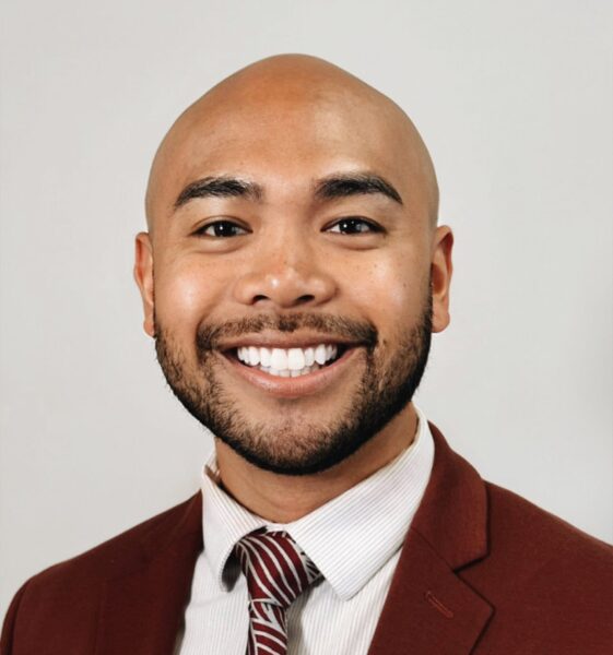 Headshot of C. Oliver Tacto