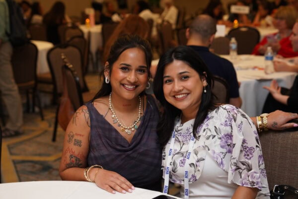 Attendees at a table at the 2025 ACHA Awards & Fellows Ceremony