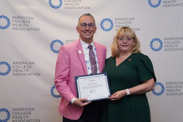 Katrin Wesner-Harts and Ryan Travia at the 2025 ACHA Awards & Fellows Ceremony