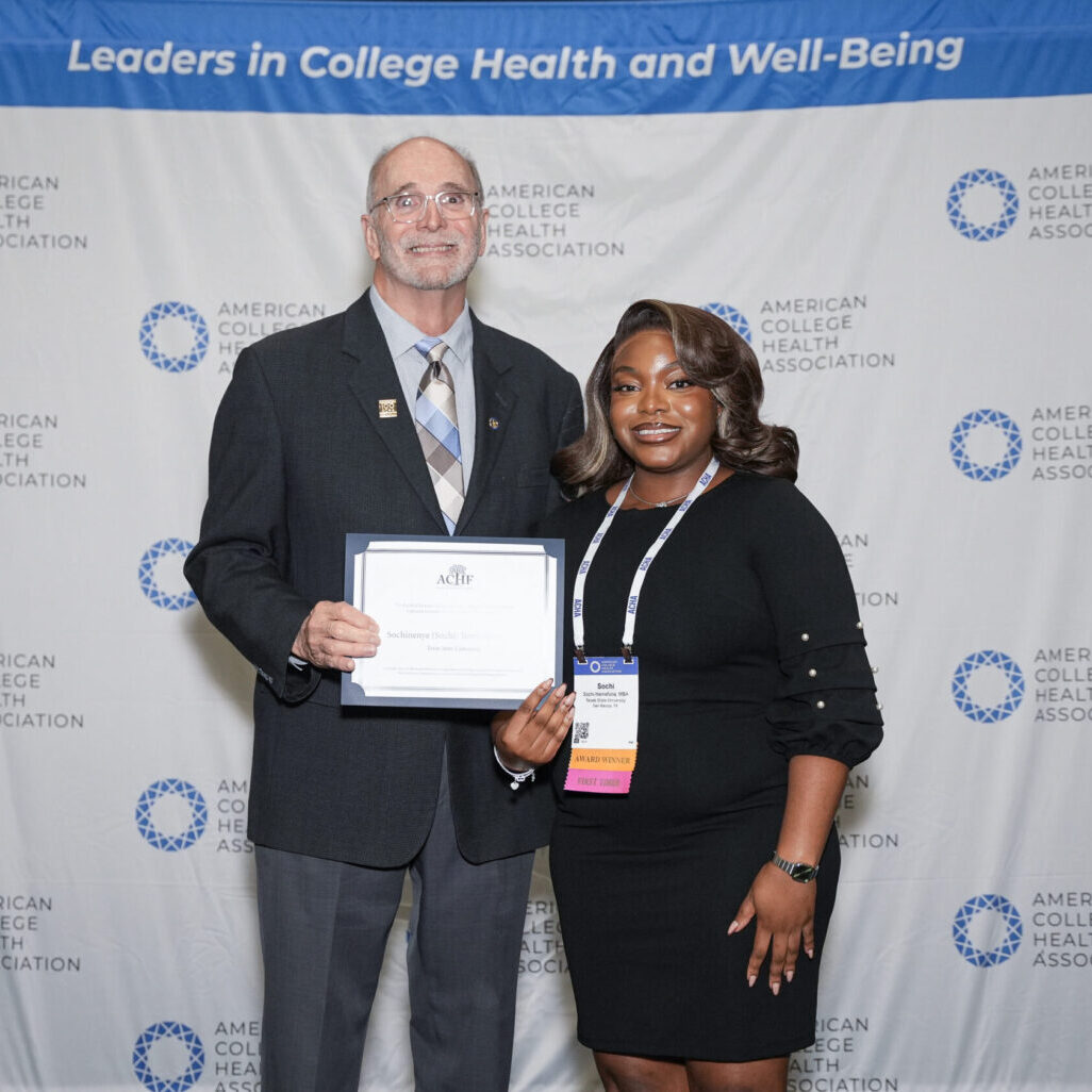 ACHF Chair Michael Huey presenting a certificate to ACHF Award Recipient Sochi Ikemefuna
