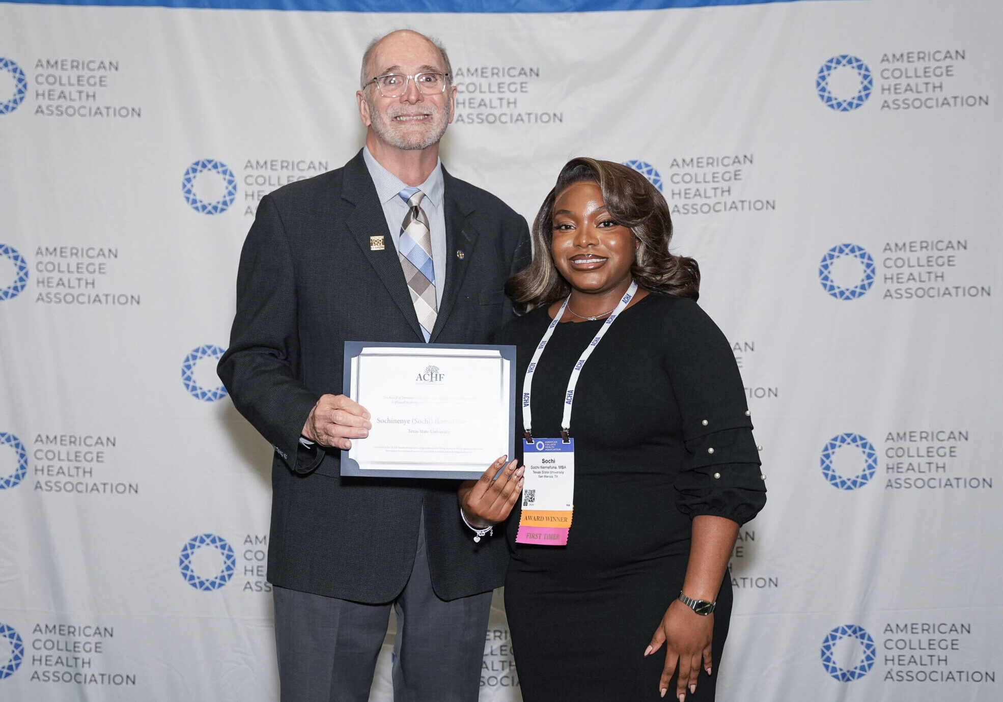 ACHF Chair Michael Huey presenting a certificate to ACHF Award Recipient Sochi Ikemefuna