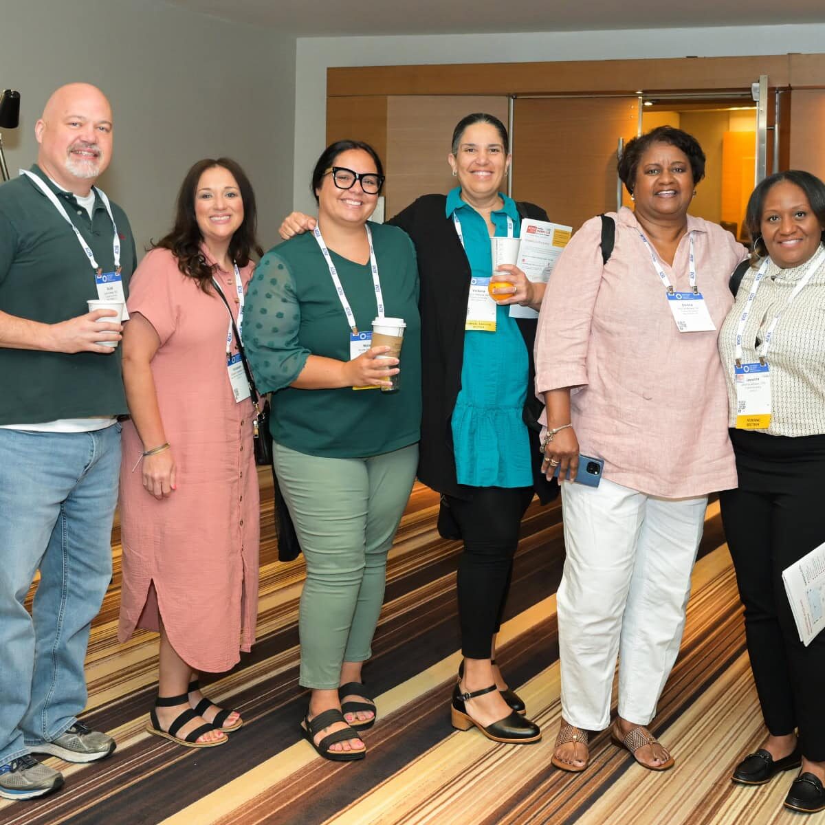 Group of smiling conference attendees