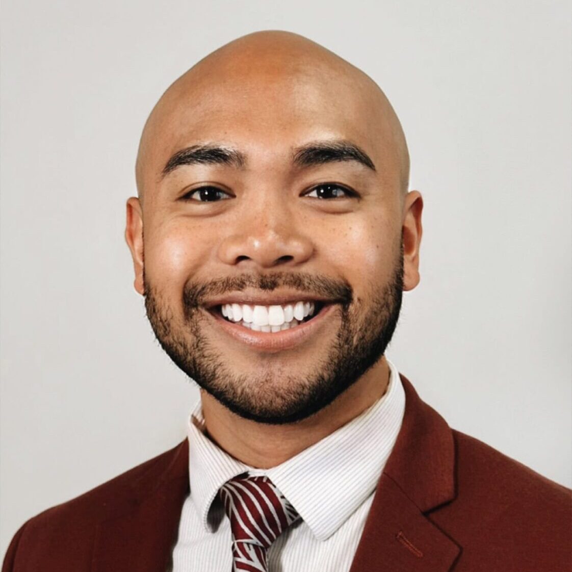 Headshot of C. Oliver Tacto