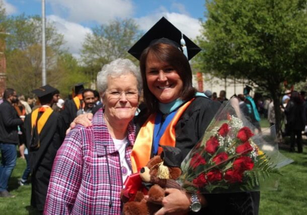 Karen and Julie Yingling at a graduation ceremony