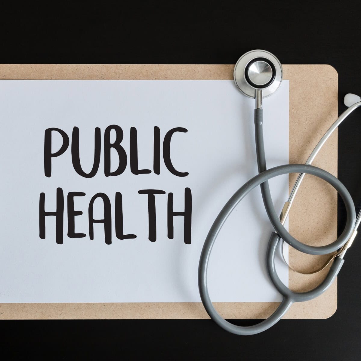A stethoscope and a clipboard that has Public Health written on a piece of paper